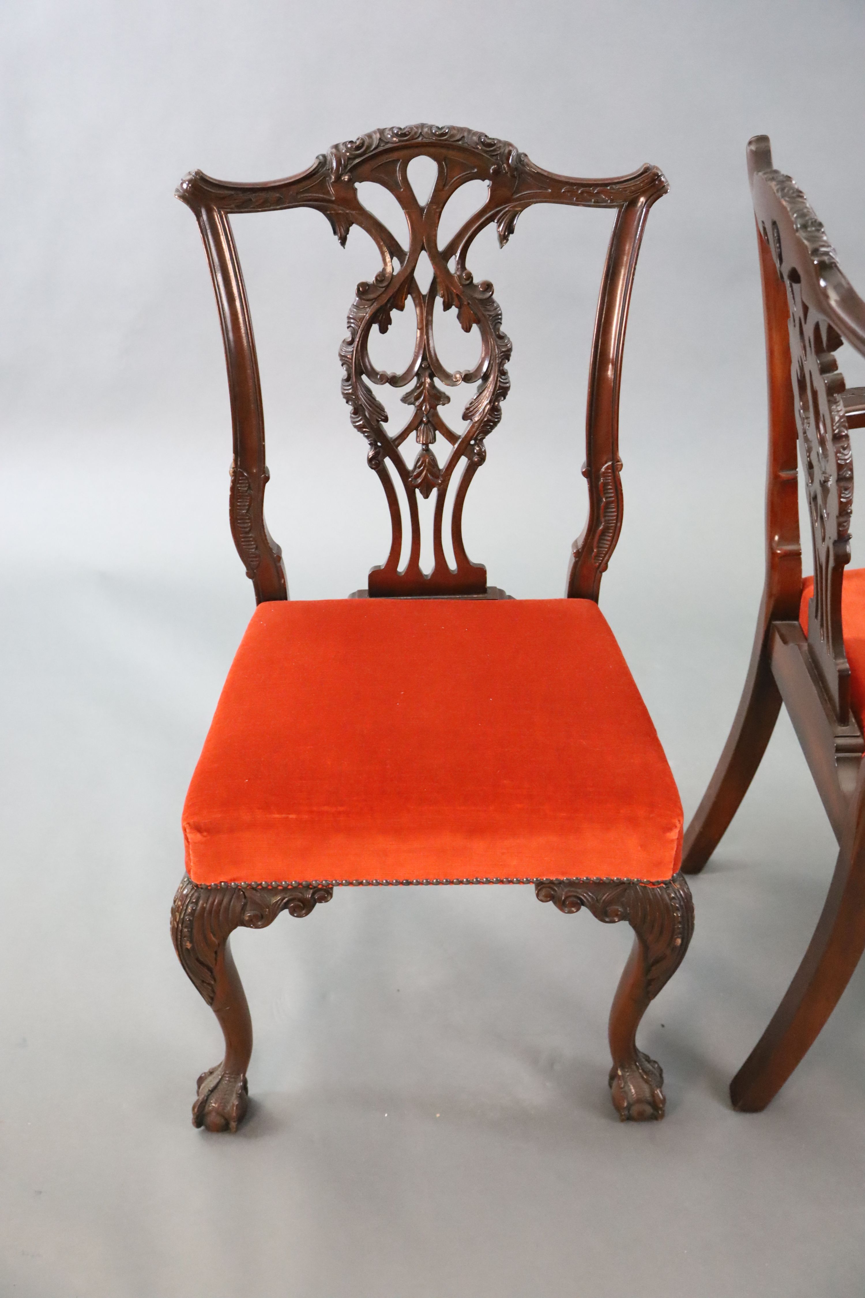 A set of eight Chippendale Revival mahogany dining chairs, carvers W.2ft D.2ft H.3ft 4in.